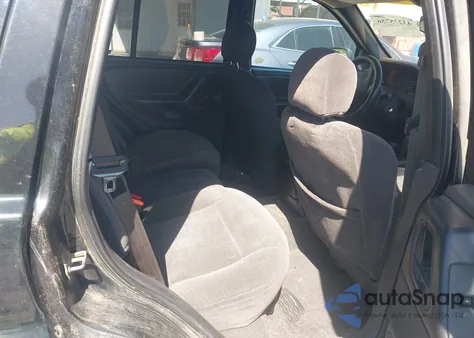 2001 Jeep Grand Cherokee Laredo из США, поврежденный, VIN 1J4GW48N31C556091